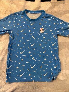 Nike Blue Graphic Swoosh Tee with White Print